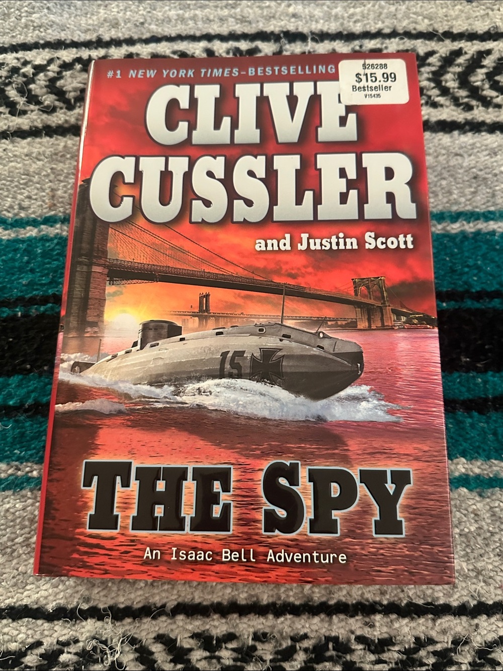 The Spy, An Isaac Bell Adventure Hardcover Book by Clive Cussler & Justin Scott